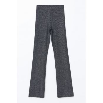 Pantaloni cu aspect stralucitor