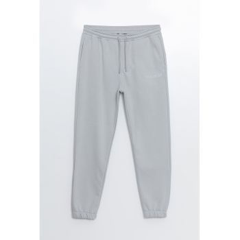 Pantaloni de trening cu buzunare laterale