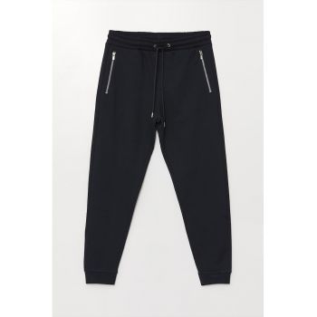 Pantaloni de trening cu buzunare cu fermoar