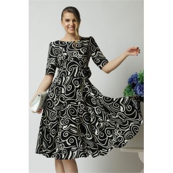Rochie de zi din voal neagra cu imprimeuri si floare in talie