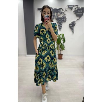 Rochie midi din bumbac, cu elastic in talie si imprimeu galben pe fond turcoaz
