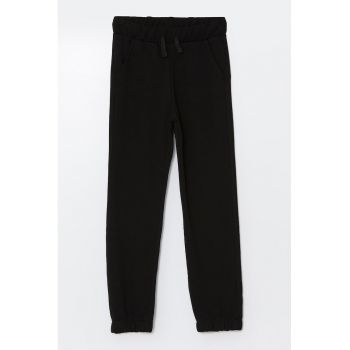 Pantaloni de trening cu buzunare oblice