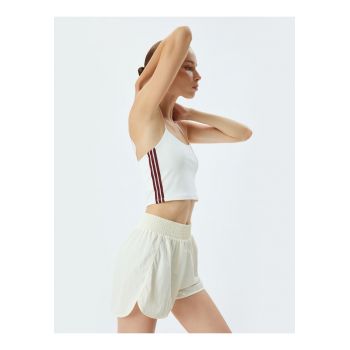 Top cu model in dungi si bretele inguste