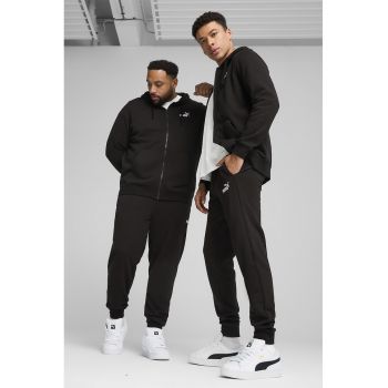Pantaloni de trening cu croiala conica si buzunare laterale