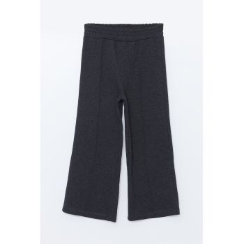 Pantaloni cu model uni si talie elastica