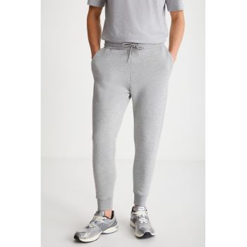 Pantaloni de trening cu talie medie si snur