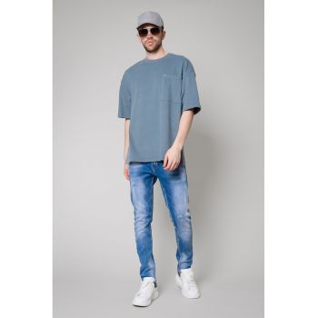 Blugi cu aspect decolorat si talie medie