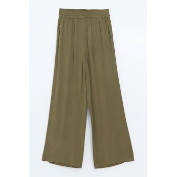 Pantaloni ampli cu talie elastica