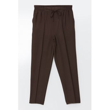 Pantaloni conici cu snur si pliuri