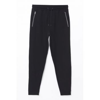 Pantaloni de trening conici cu snur de ajustare
