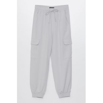 Pantaloni cargo cu buzunare cu clapa