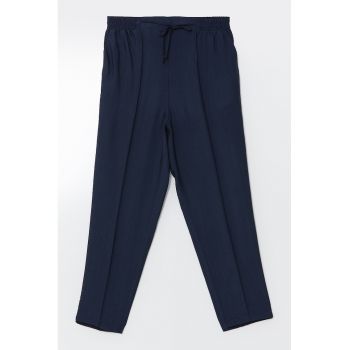 Pantaloni conici cu snur si pliuri