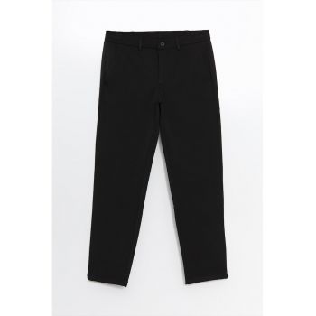 Pantaloni eleganti cu talie medie