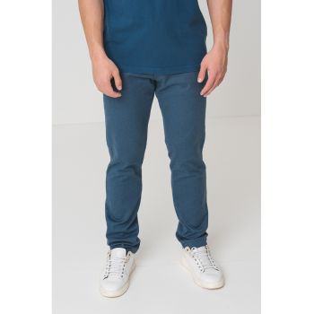 Pantaloni slim fit cu buzunare oblice