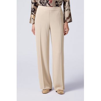 Pantaloni cu croiala ampla si talie elastica