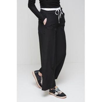 Pantaloni cu croiala ampla si talie inalta