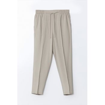 Pantaloni cu talie medie si model uni