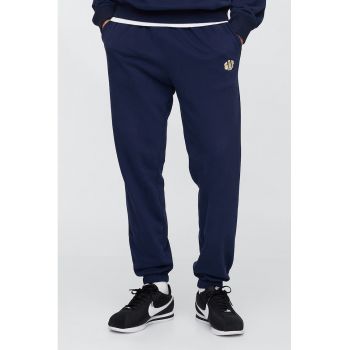 Pantaloni de trening cu buzunare oblice