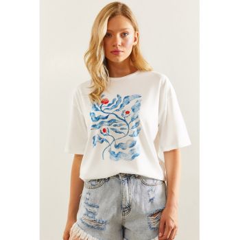 Tricou cu decolteu la baza gatului si model floral