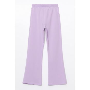 Pantaloni evazati cu talie elastica