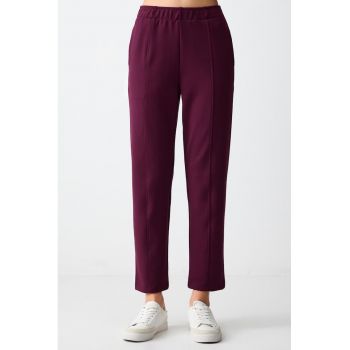 Pantaloni de trening relaxed fit cu buzunare