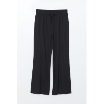Pantaloni cu croiala ampla si talie ajustabila