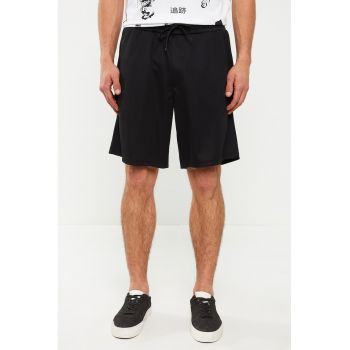 Pantaloni scurti uni cu buzunare laterale