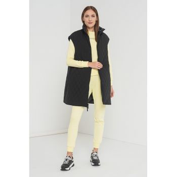 Vesta lunga cu model reversibil si aspect matlasat