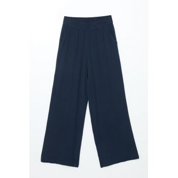 Pantaloni ampli cu talie elastica