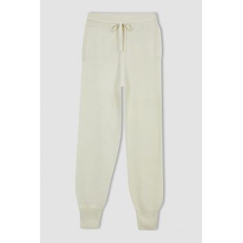 Pantaloni sport cu talieinalta si buzunare laterale