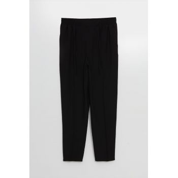 Pantaloni cu talie medie si model uni