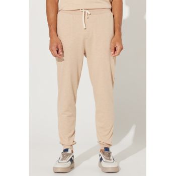 Pantaloni de trening din bumbac cu model uni si snur de ajustare in talie