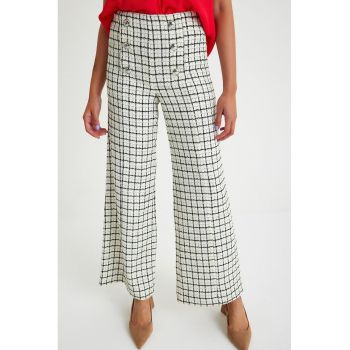 Pantaloni din tuid cu croiala conica si model in carouri