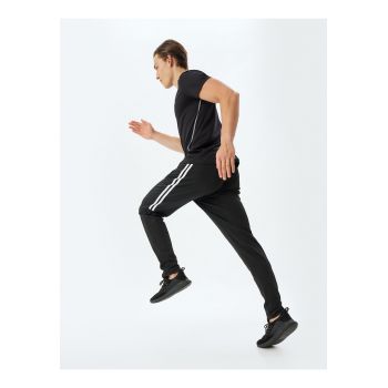 Pantaloni de trening conici cu detalii contrastante