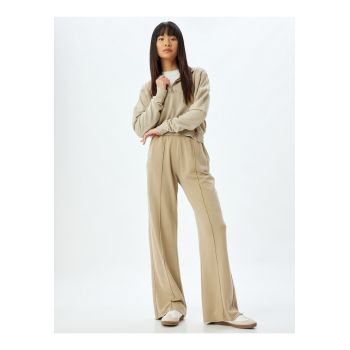 Pantaloni de trening cu croiala ampla - talie elastica si cusaturi frontale