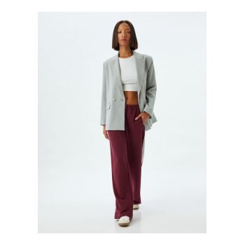 Pantaloni de trening din amestec de bumbac cu croiala ampla