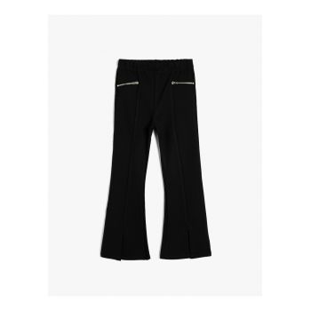 Pantaloni evazati cu model uni