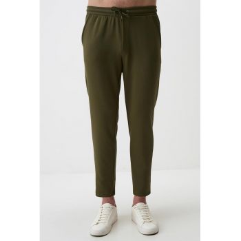 Pantaloni slim fit de trening din amestec de modal cu buzunare laterale