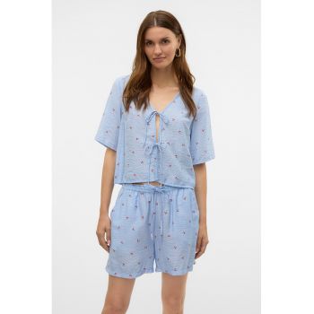 Bluza cu model floral si prinderi laterale