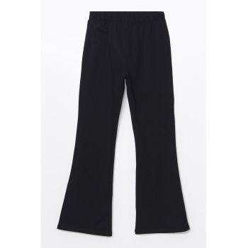 Pantaloni evazati cu talie elastica