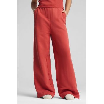 Pantaloni de trening cu croiala ampla si buzunare oblice
