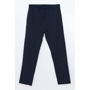 Pantaloni cu model uni si snur de ajustare in talie