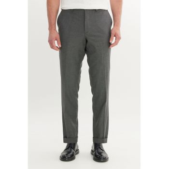Pantaloni conici cu talie medie