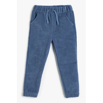 Pantaloni cu snur si buzunare laterale