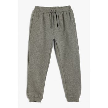 Pantaloni de trening cu buzunare oblice