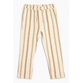 Pantaloni texturati din bumbac cu model in dungi