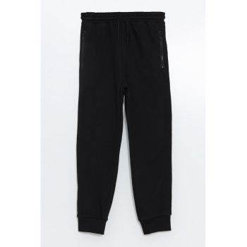 Pantaloni de trening cu buzunare cu fermoar