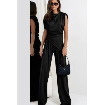 Compleu cu pantaloni, din tricot fin de bumbac, cu bluza in colt si umeri supradimensionati, negru