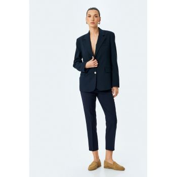 Pantaloni capri conici