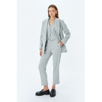Pantaloni capri conici